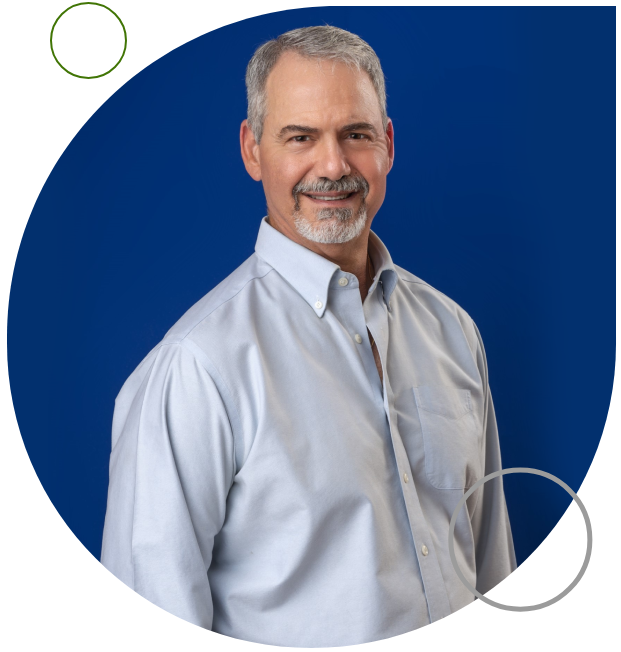 A man in a white shirt and blue shirt